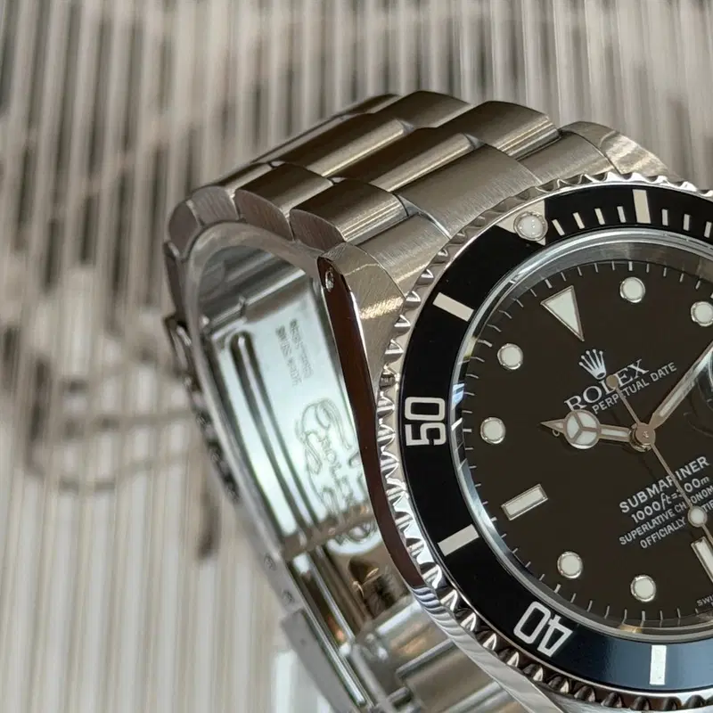 Rolex Submariner Date. 16610